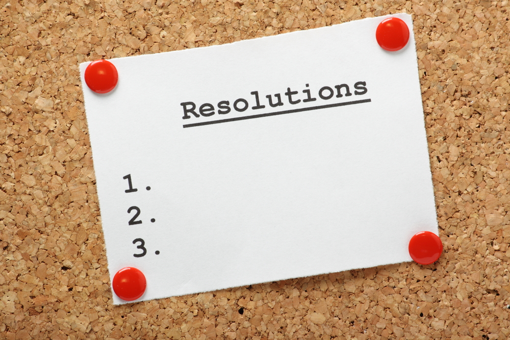 List of resolutions tacked on a cork bulletin board