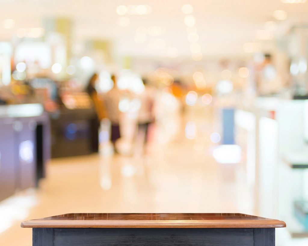 An unfocused image of a well-lit store scene