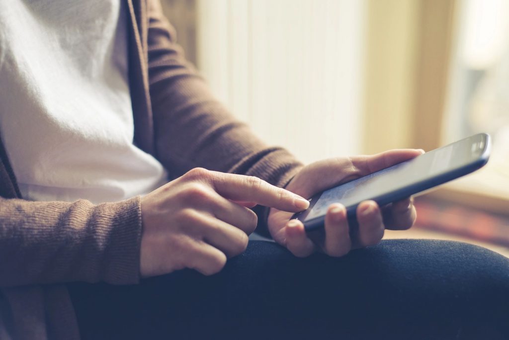 Close-up of a person using a mobile phone