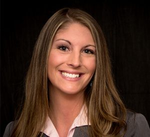 A professional headshot of a businesswoman