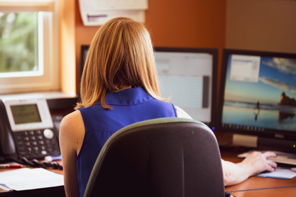 A woman working at her desk