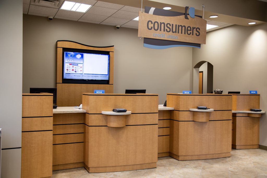 Consumers Credit Union office front desk with three bank teller windows