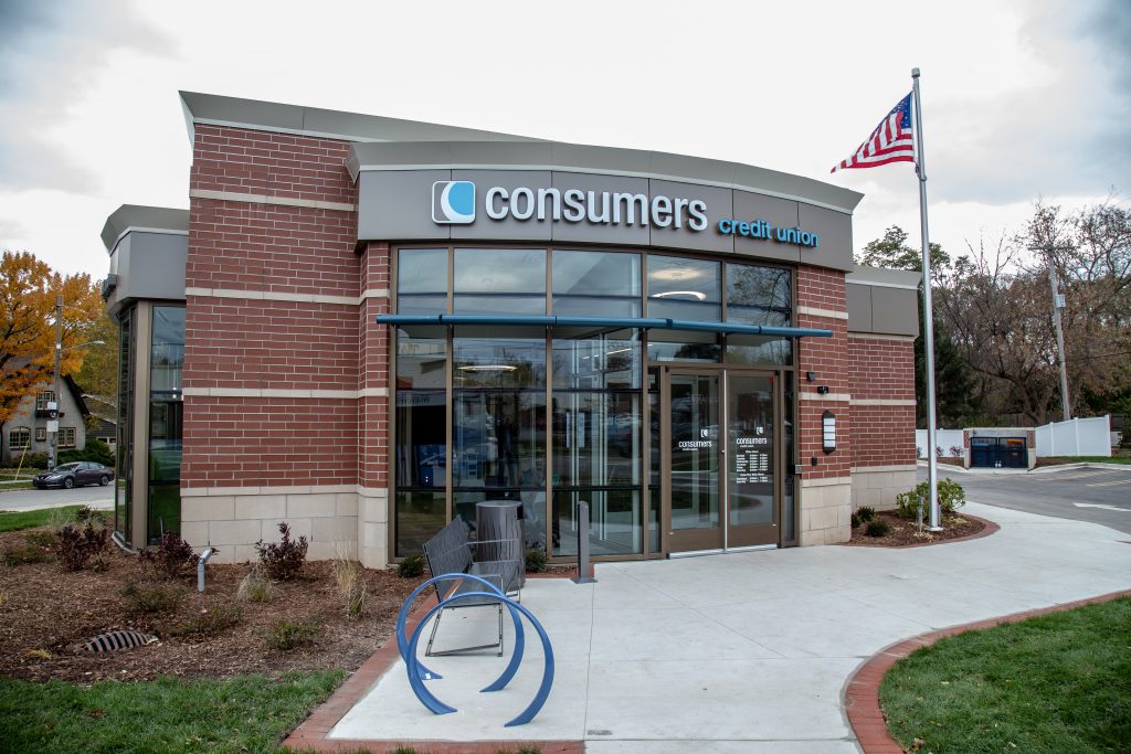 The exterior of a Consumers Credit Union office on an overcast day