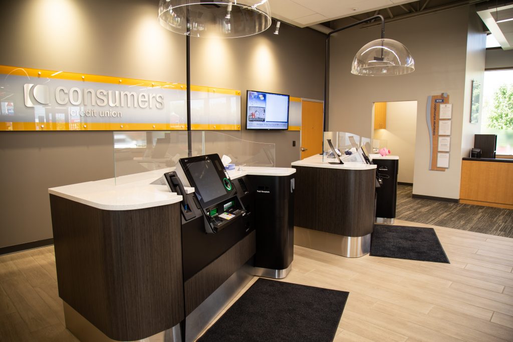 Side view of two self-service tellers at a Consumers Credit Union office