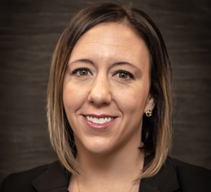 A woman smiling for a professional photo