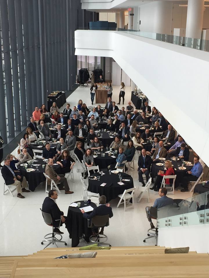 A view of a large meeting from the top of the Consumers Credit Union headquarters