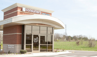 An outside view of a Consumers Credit Union office on a sunny day