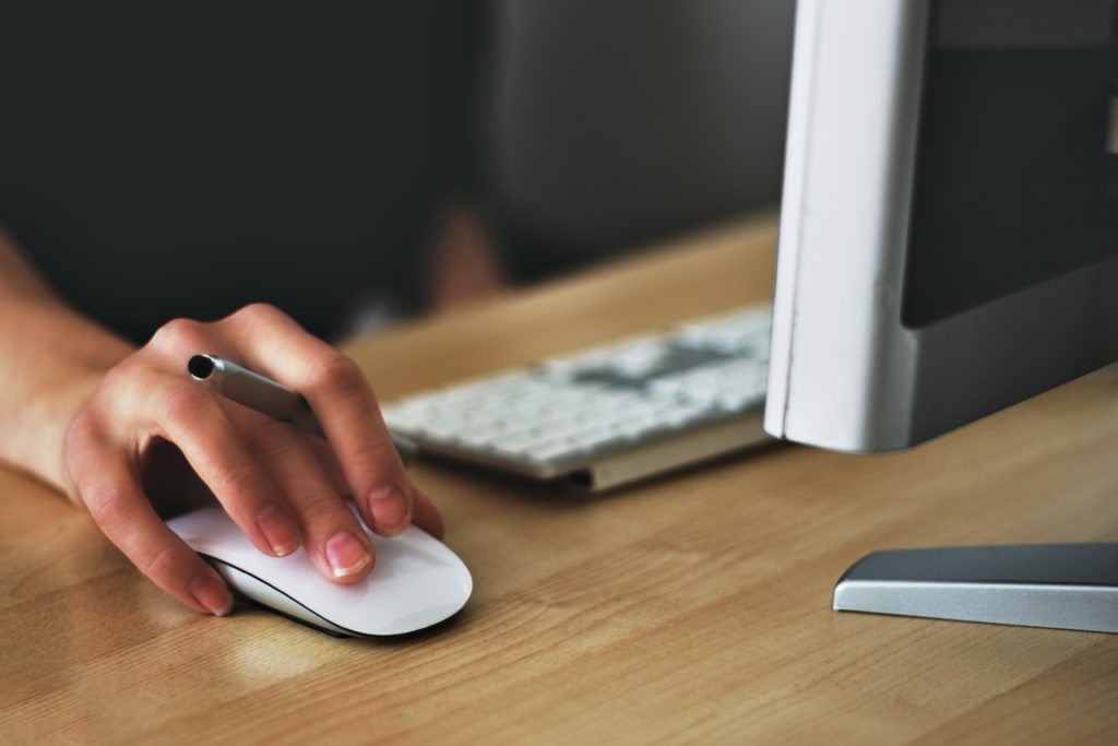 Person working at a desktop computer