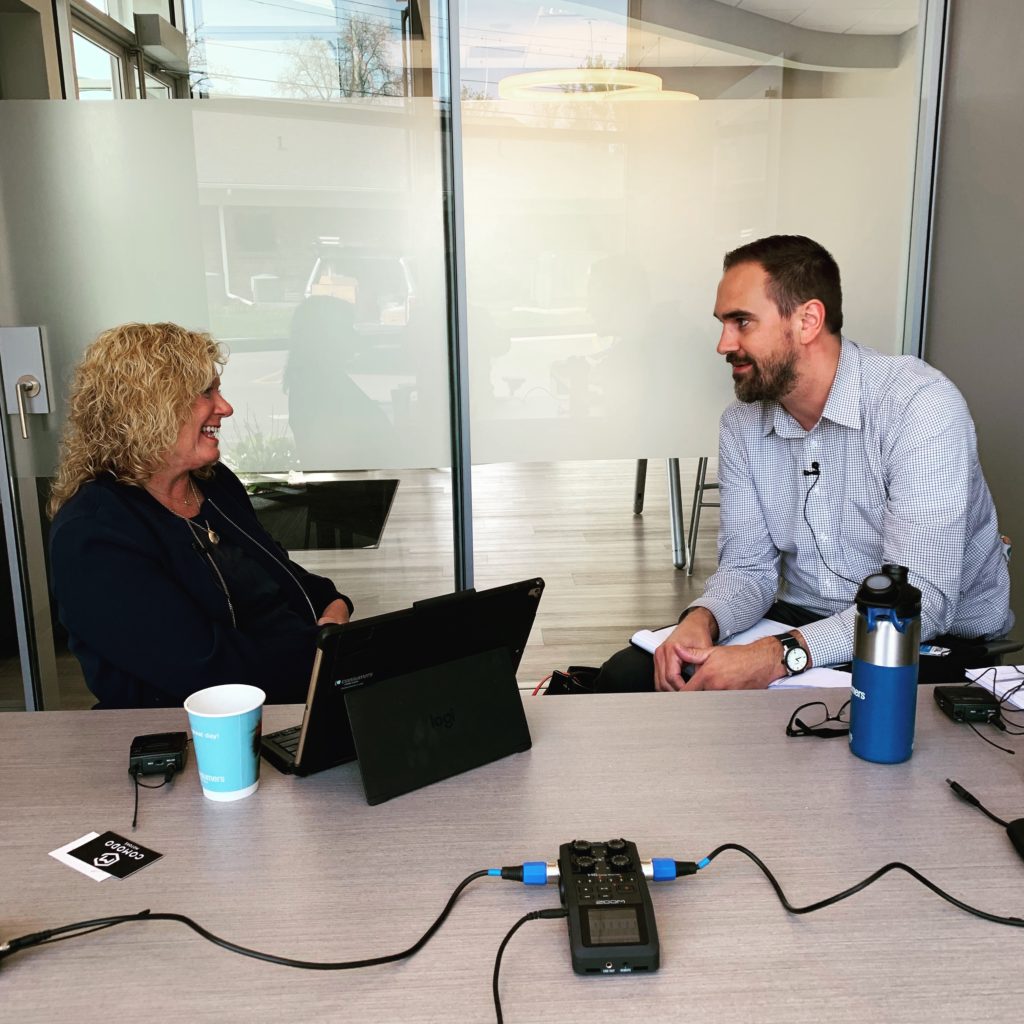 Jeremy and Lynne record a podcast.