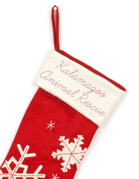 Christmas stocking with shadow on white background