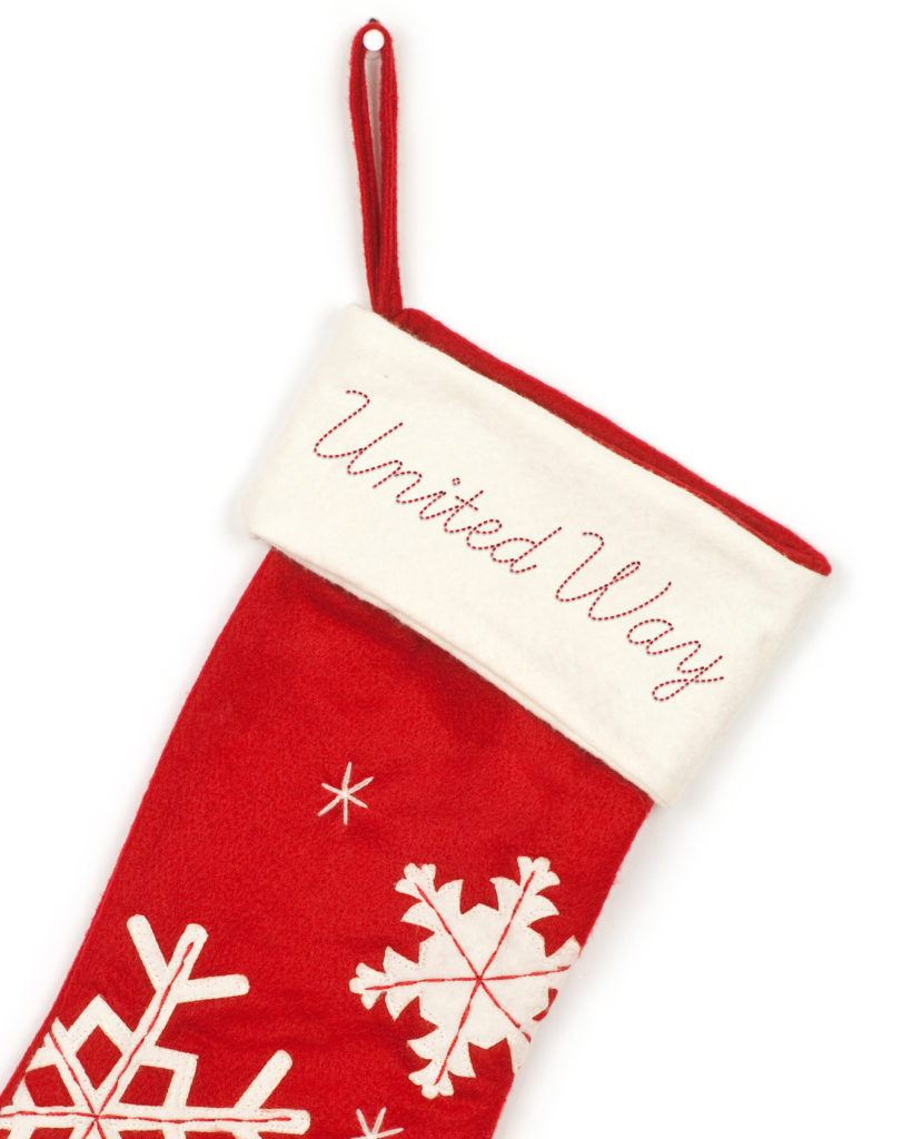 Christmas stocking with shadow on white background